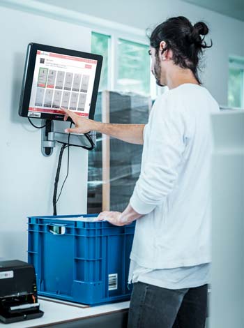 RFID Arbeitstisch zum Kommissionieren und Verpacken von Waren